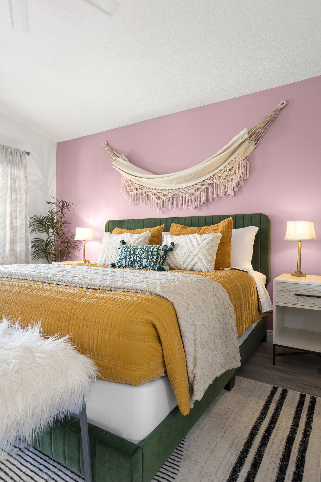 Pool deck with lounge chairs and umbrella